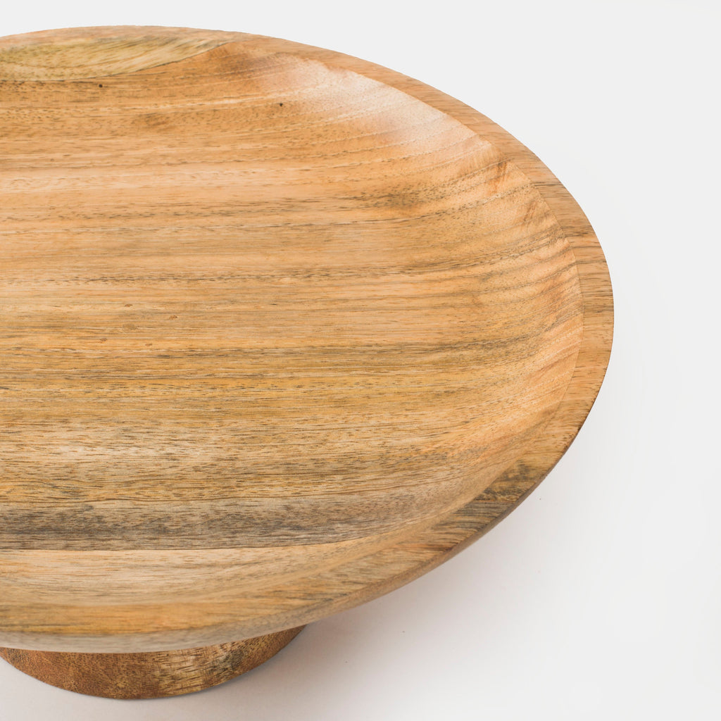 Wooden cutting board on a white background