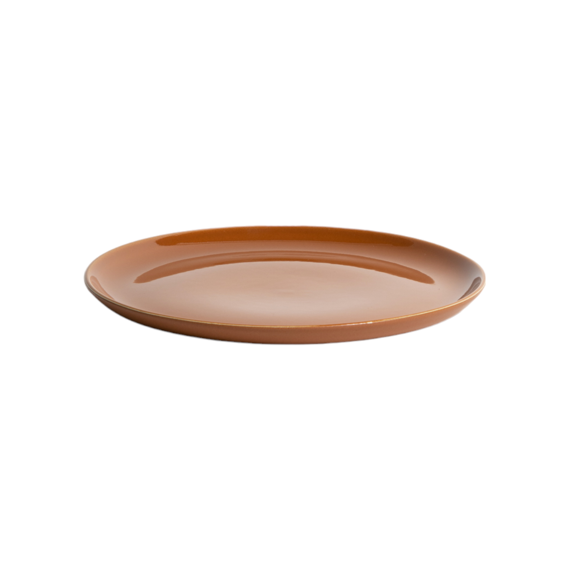 Ceramic plate with a brownish-orange glaze on a white background