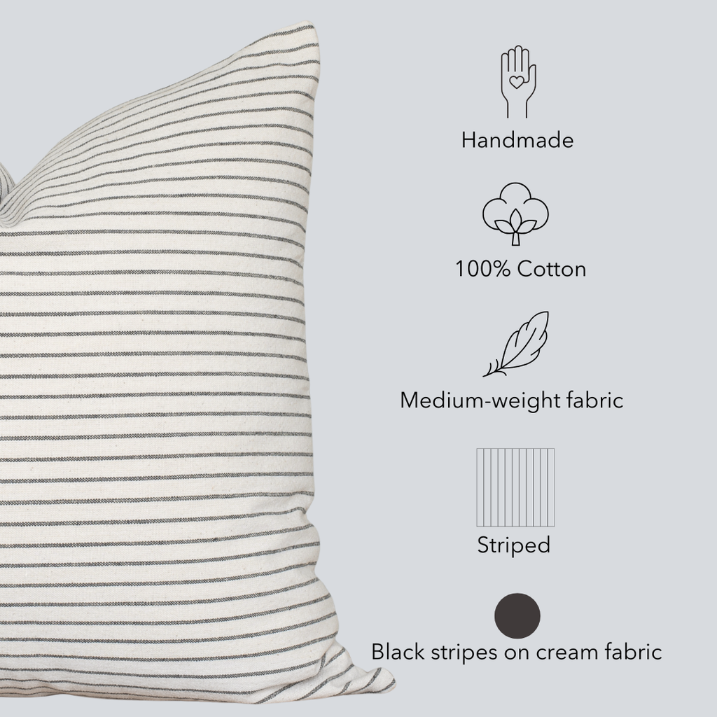 Striped pillow with black and white lines on a light gray background, featuring icons and text about the product.