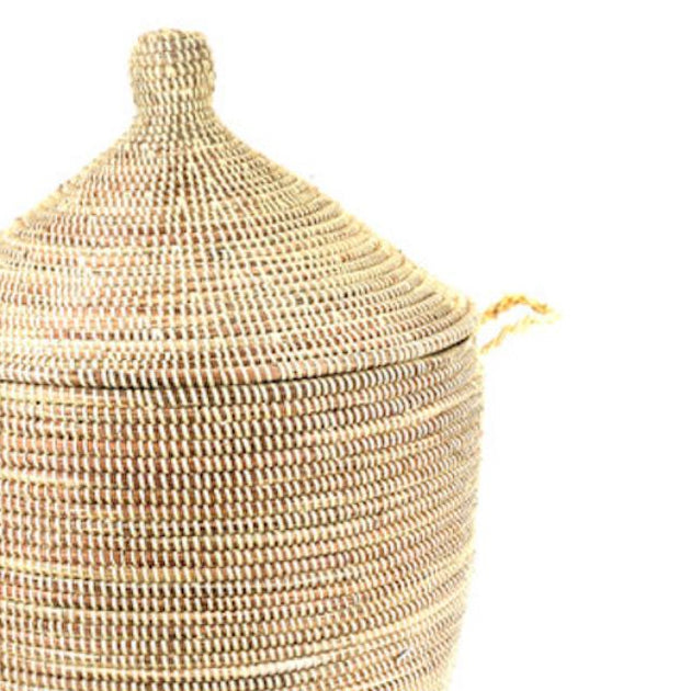 Woven basket with a lid on a white background