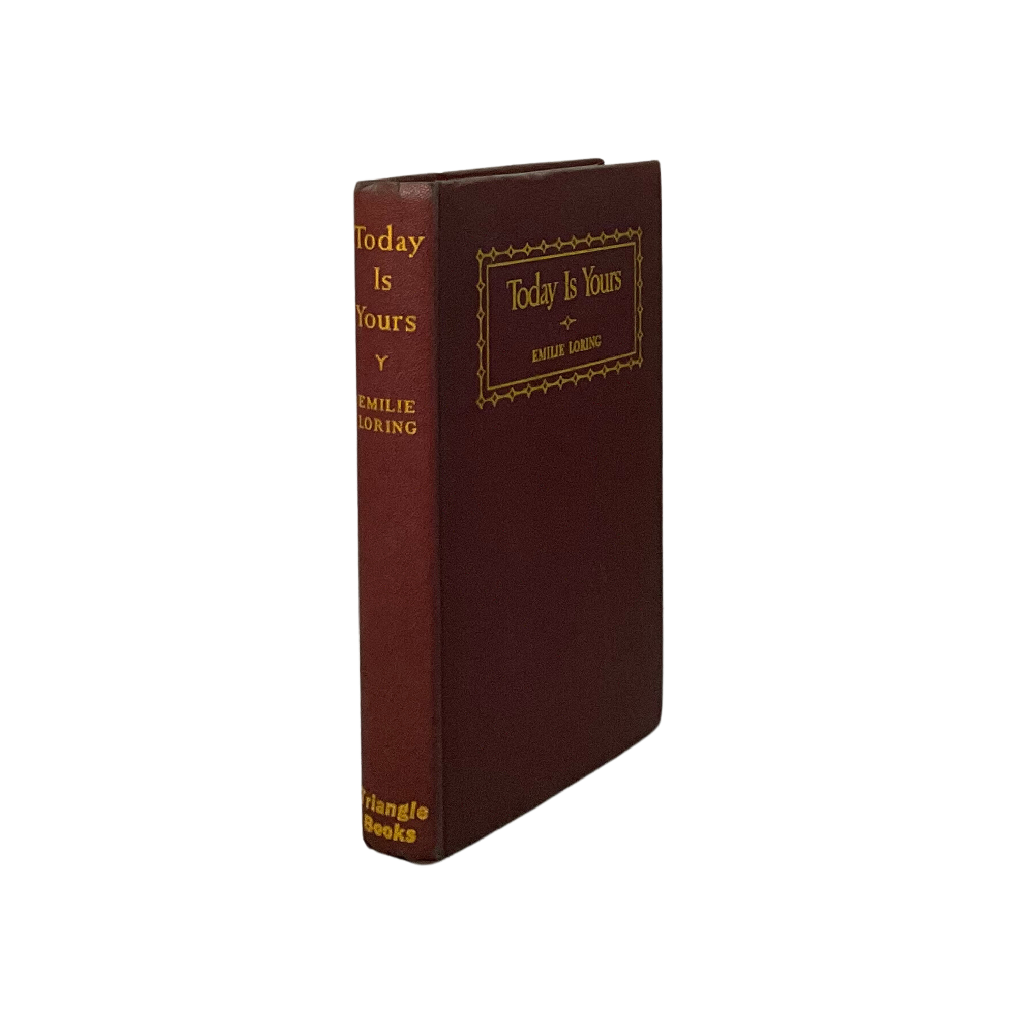 Brown book with gold text on a white background