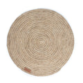Round woven mat with a natural fiber texture on a white background