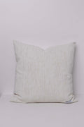 Textured pillow on a light gray background