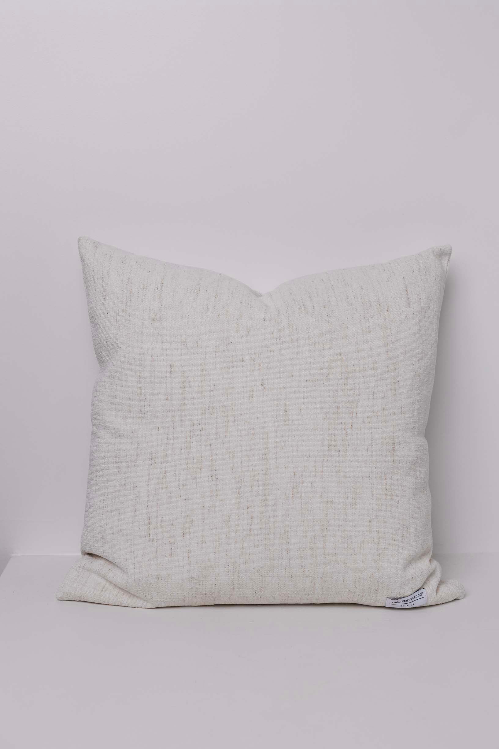 Textured pillow on a light gray background