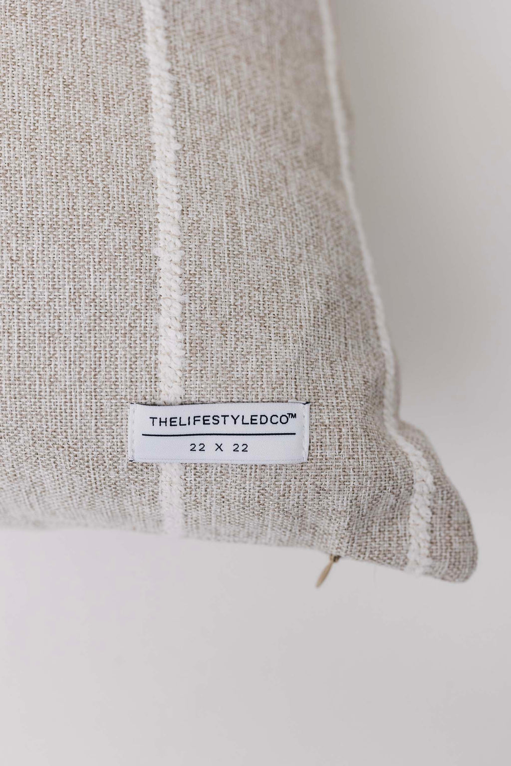 Textile product with 'The Lifestyle Led Co.' label on a neutral background