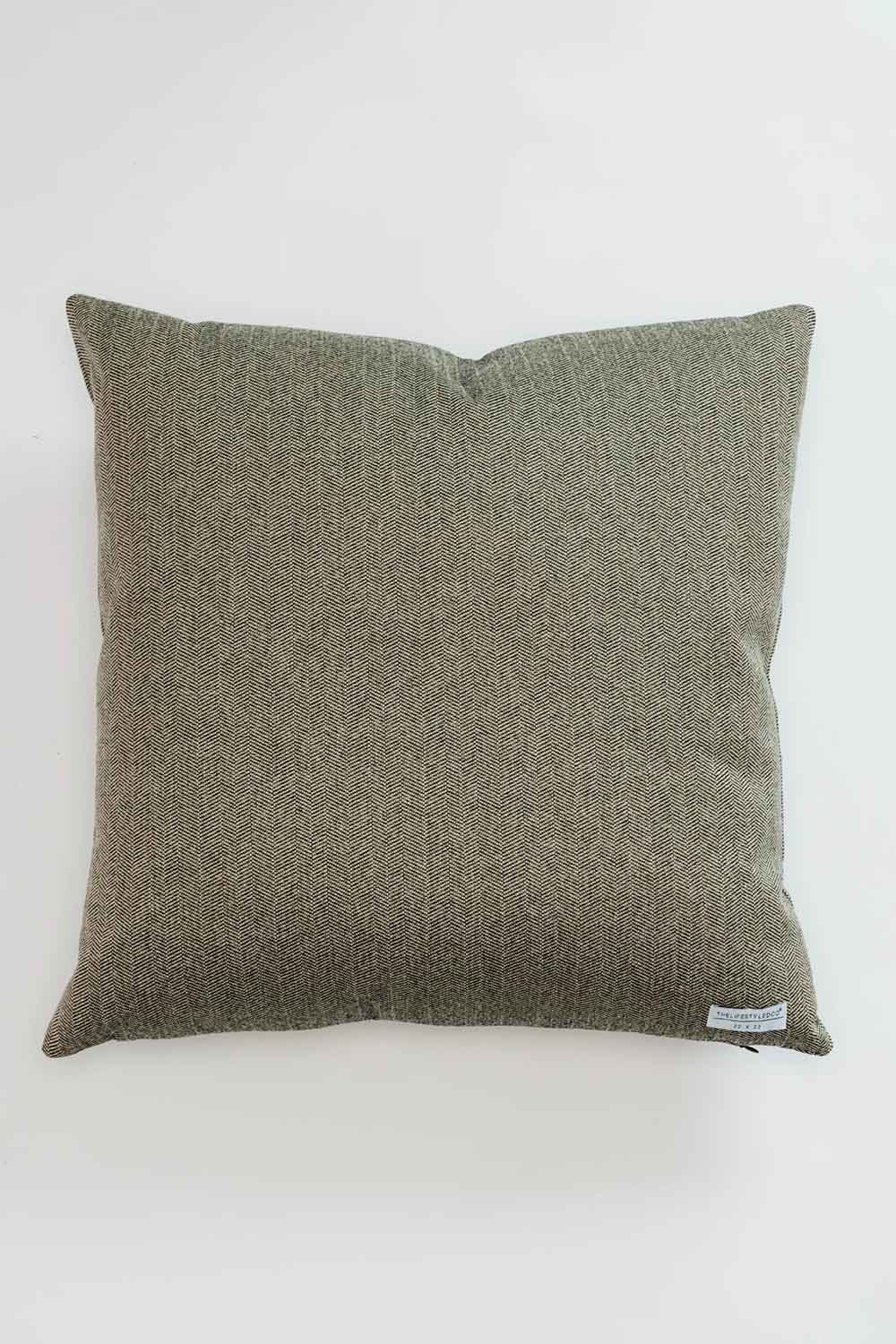 Green cushion on a white background