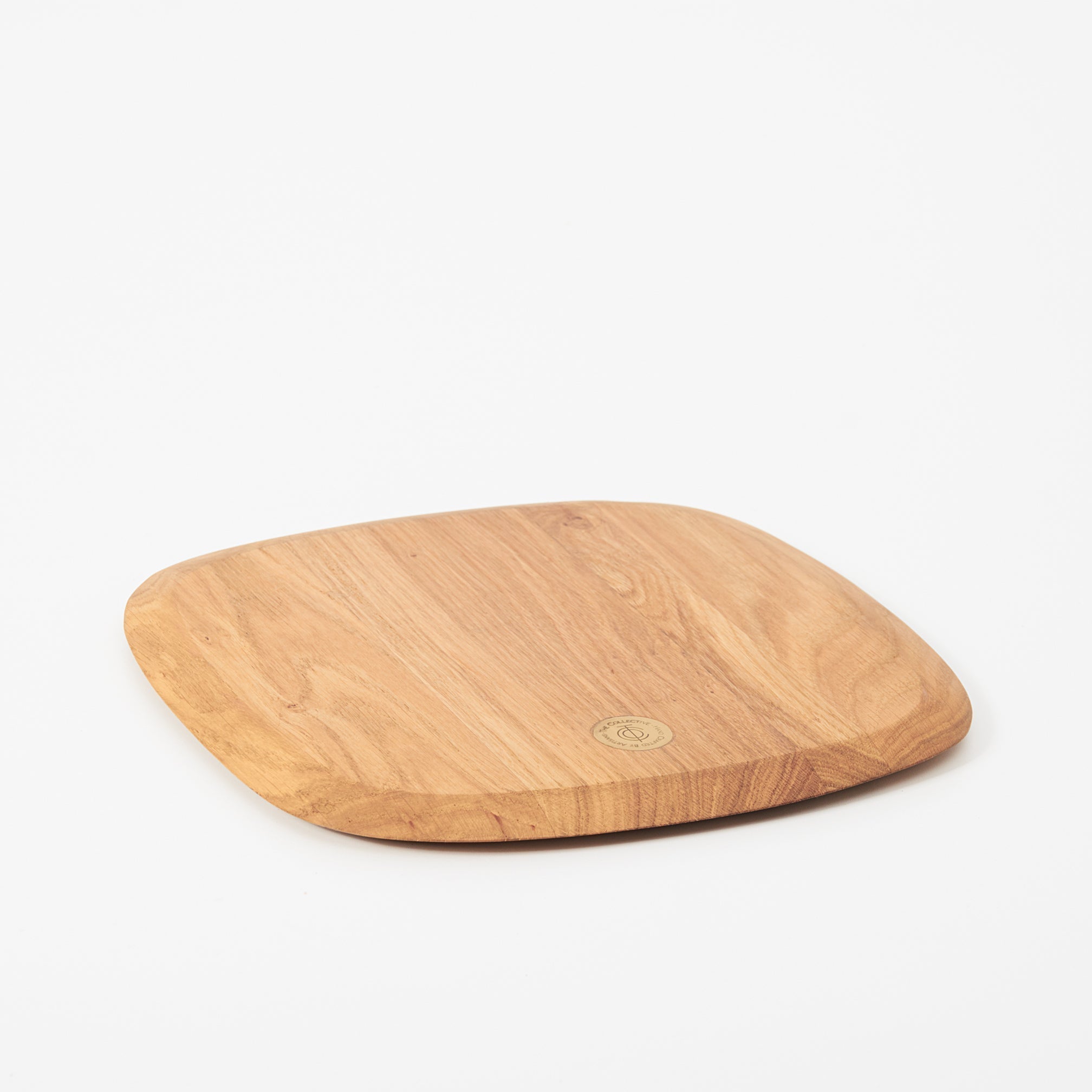 Wooden cutting board on a white background