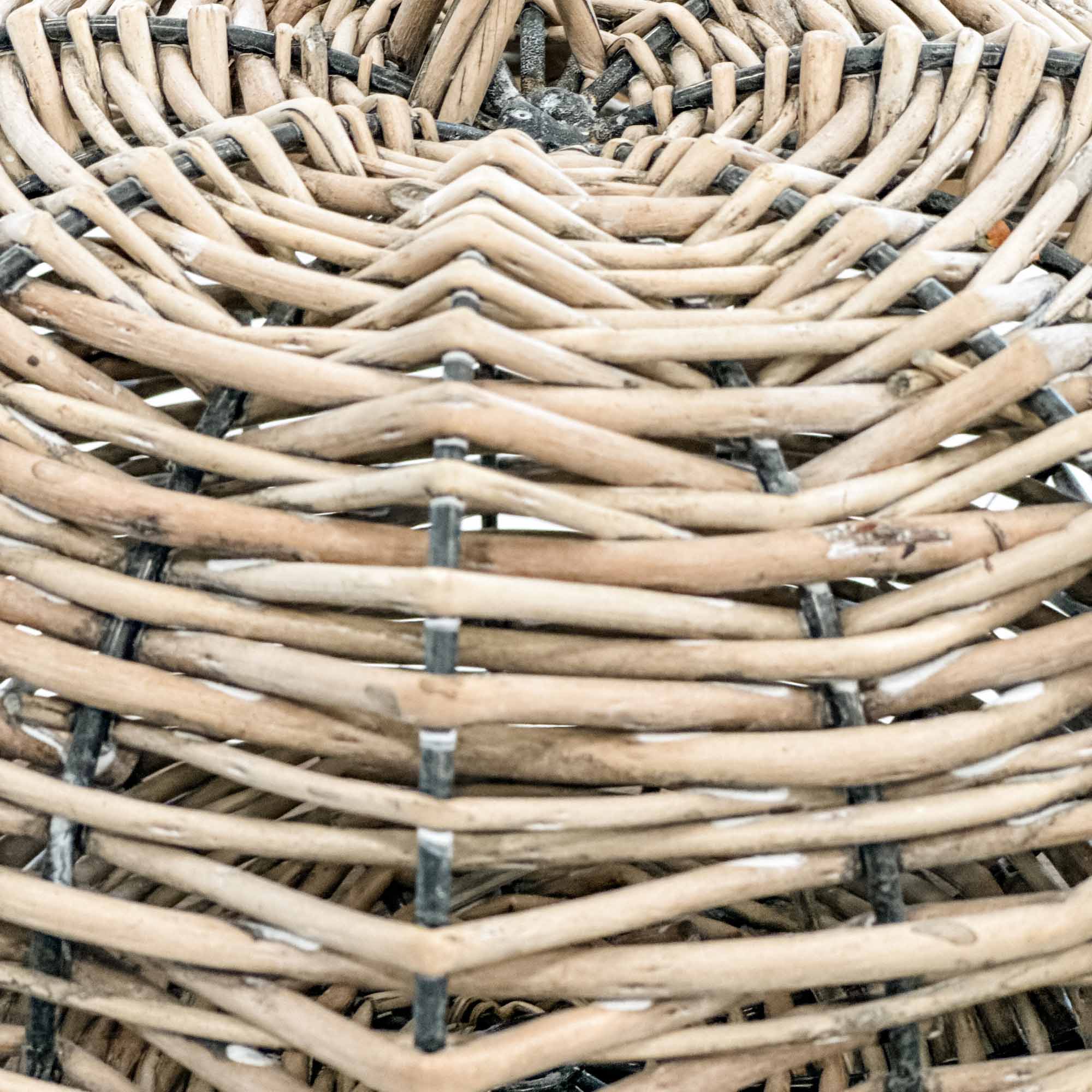Close-up of a woven basket with natural wood texture