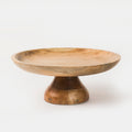 Wooden bowl with a pedestal base on a white background