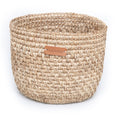 Handwoven natural bread basket made by artisans with woven natural fibers. Decorative serving basket for bread, pastries, fruit, countertop storage, and farmhouse or modern organic kitchen décor.