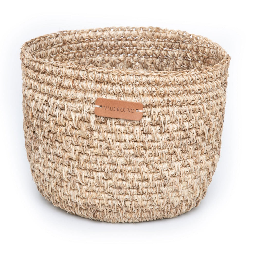 Handwoven natural bread basket made by artisans with woven natural fibers. Decorative serving basket for bread, pastries, fruit, countertop storage, and farmhouse or modern organic kitchen décor.