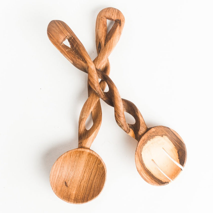 Wooden baby rattle with a white background
