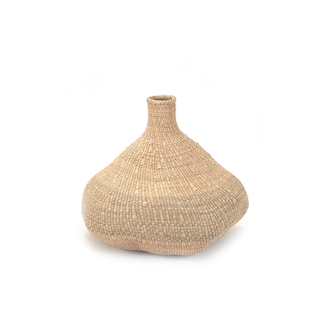 Woven beige vase on a white background
