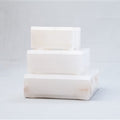 Handcrafted white Alabaster marble lidded storage box featuring natural stone veining and a minimalist square silhouette. Elegant decorative storage for jewelry, keepsakes, bathroom essentials, and coffee table styling