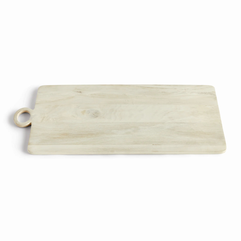 Handcrafted natural wood serving board with a rounded handle and soft organic grain for timeless European-inspired kitchen styling | Sorelle Rossi Shoppe