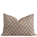 Decorative pillow with a brown and beige pattern on a white background