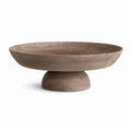Wooden bowl with a pedestal base on a white background