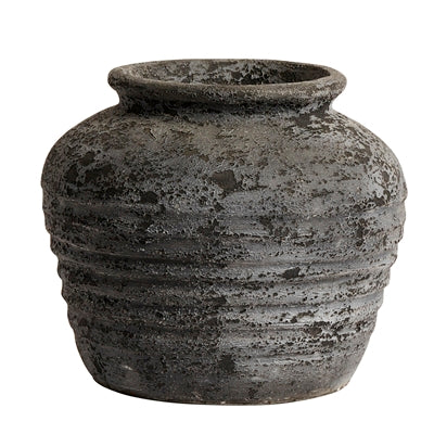 Textured gray pot on a white background