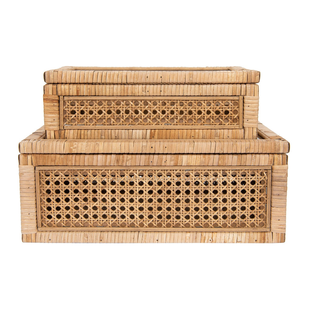 Set of two woven rattan storage boxes with geometric patterns on a white background