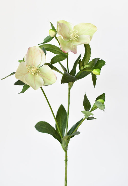 Artificial flower arrangement with green leaves and light pink flowers on a white background