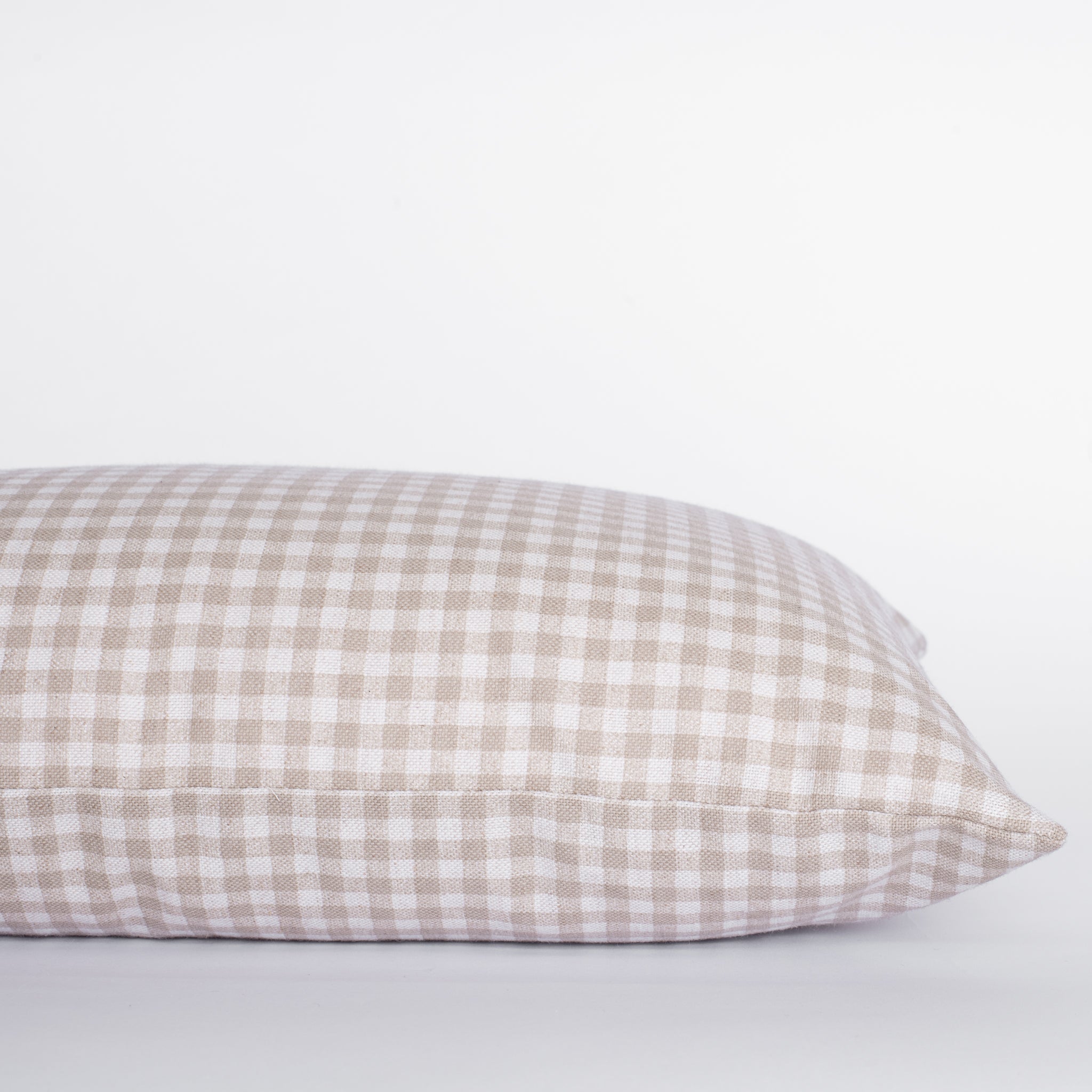 Checkered pillow on a light gray background
