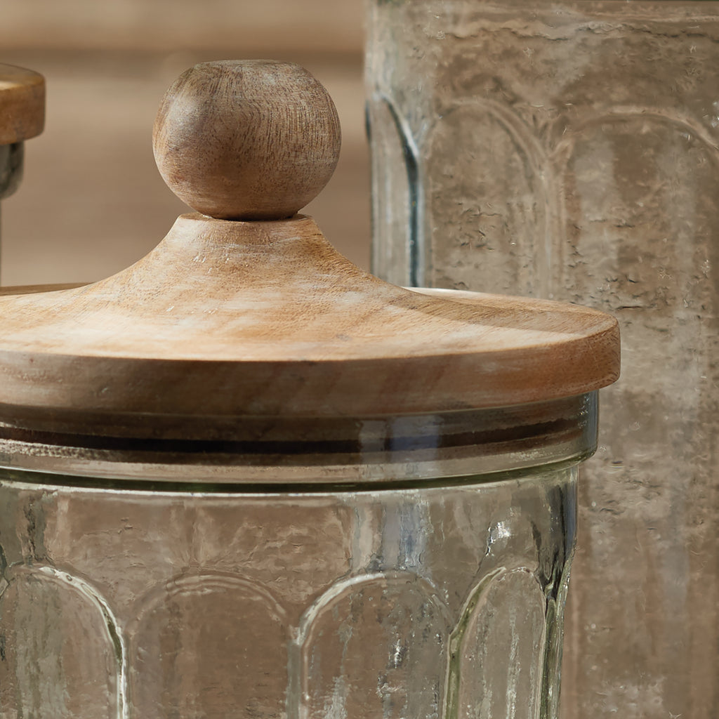 Embossed glass storage canister with a handcrafted natural wood lid styled for timeless European-inspired kitchen decor | Sorelle Rossi Shoppe