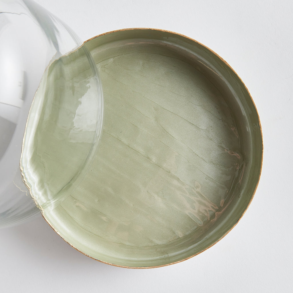 Clear glass cloche with a soft neutral ceramic base styled for timeless European-inspired kitchen and tabletop decor | Sorelle Rossi Shoppe