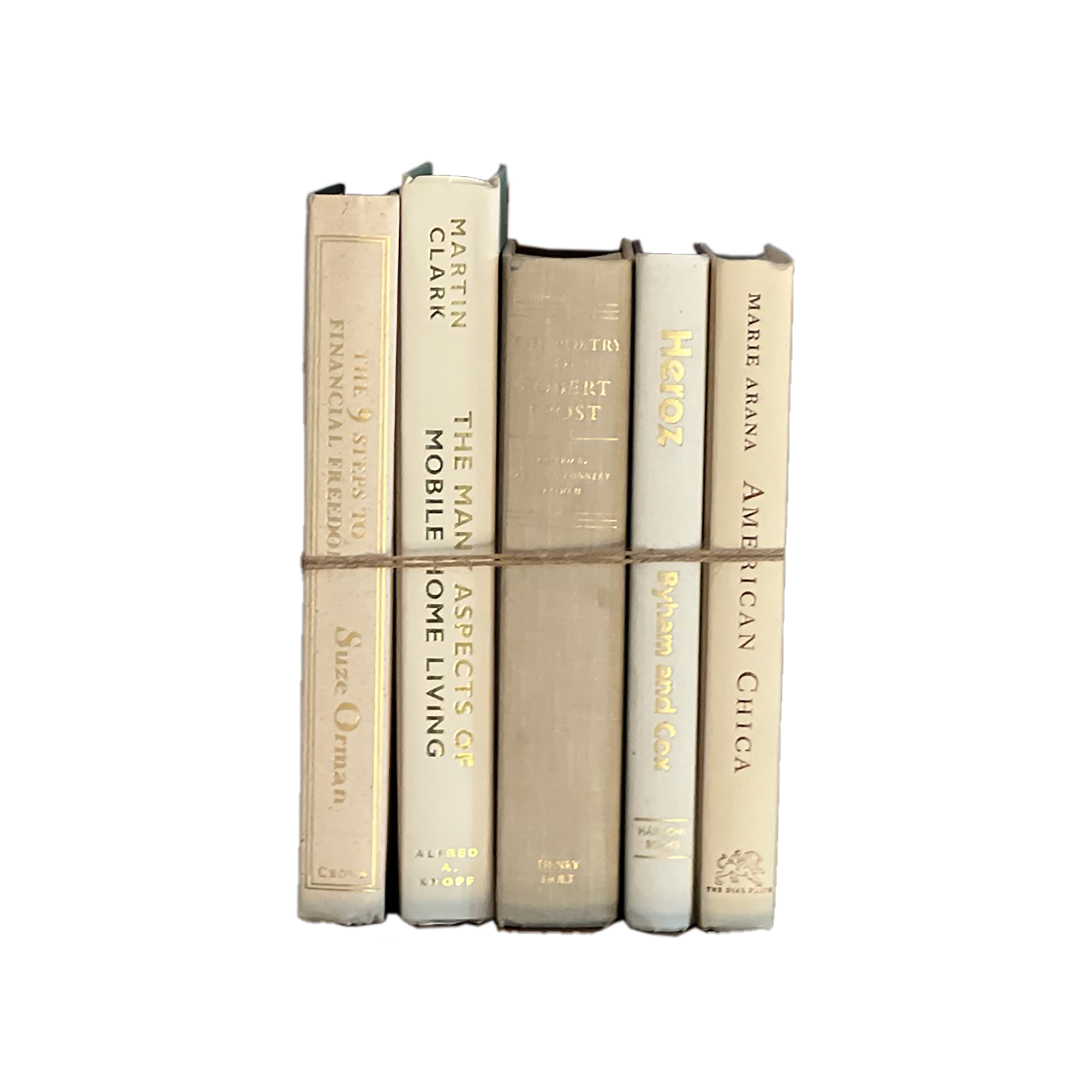 Stack of books with gold and beige spines on a white background