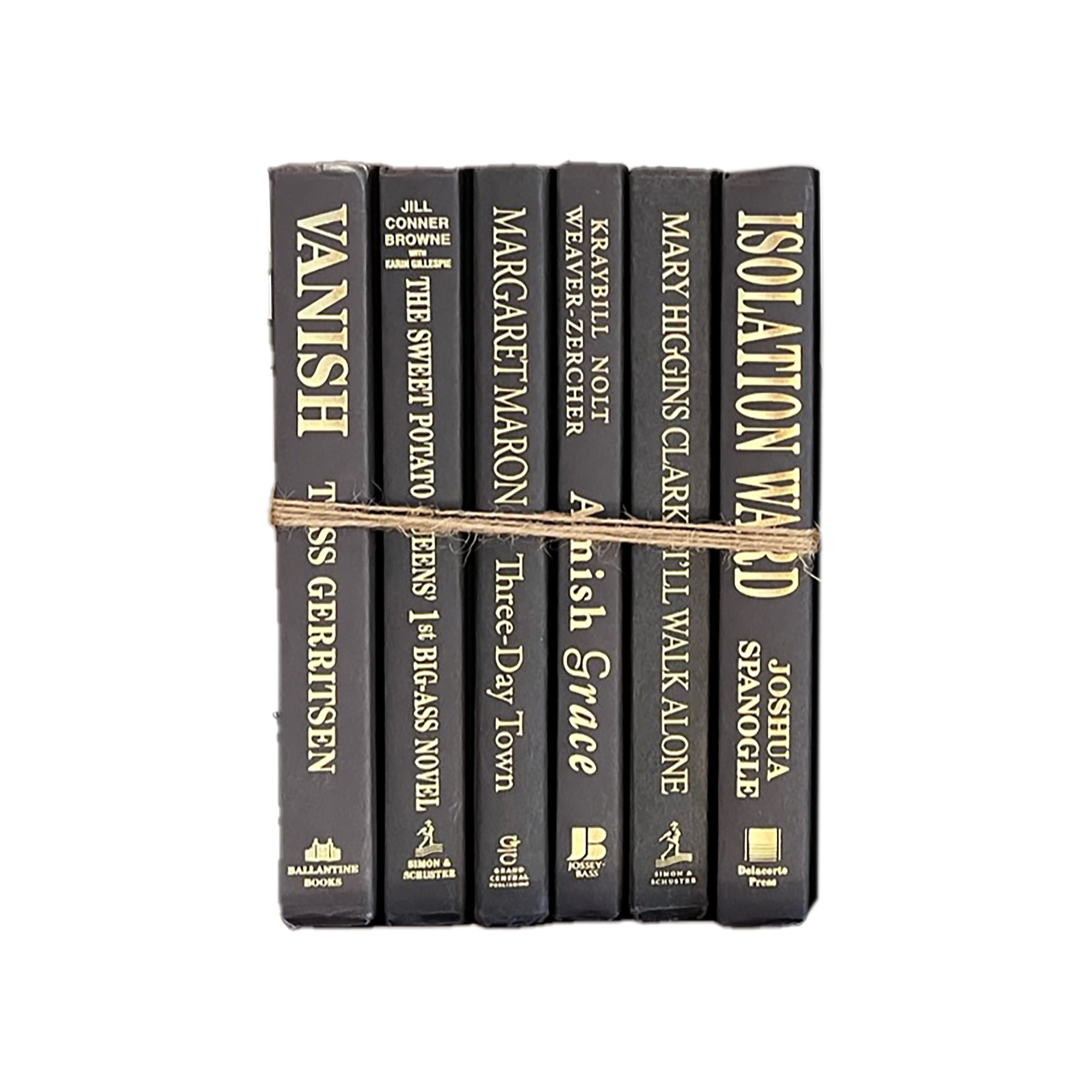 Stack of books bound together with twine on a white background