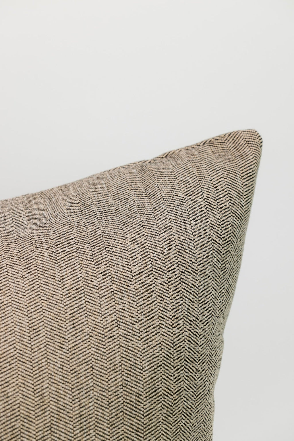 Textured pillow on a light gray background