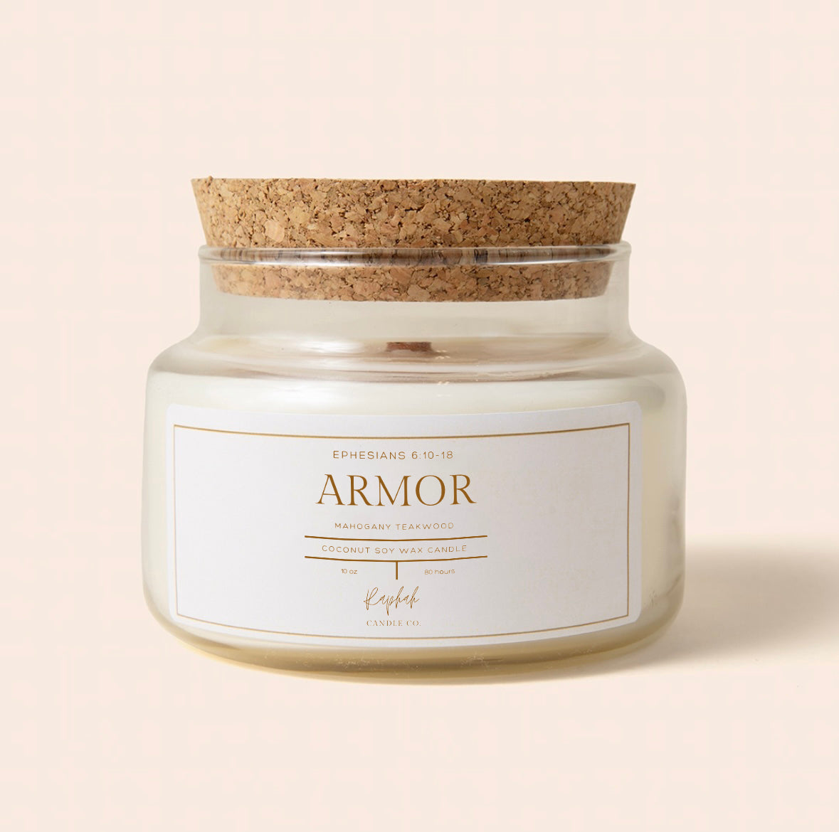 Candle jar with cork lid and 'Sabbath' label on a beige background