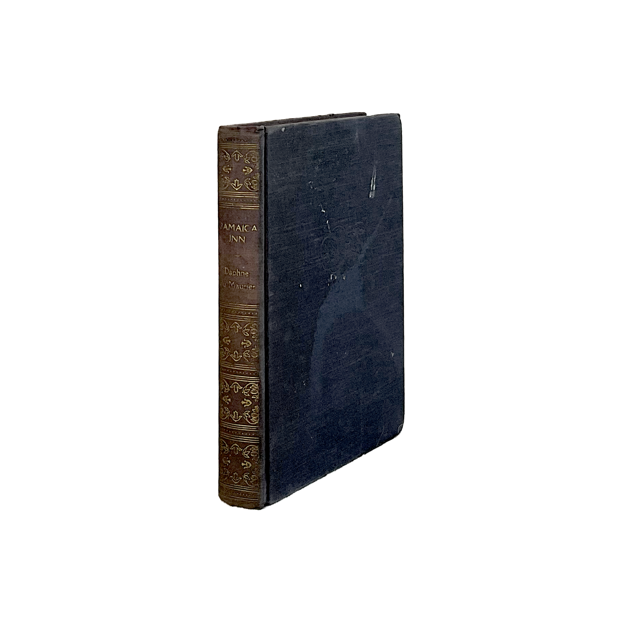 Vintage book with decorative spine on a white background