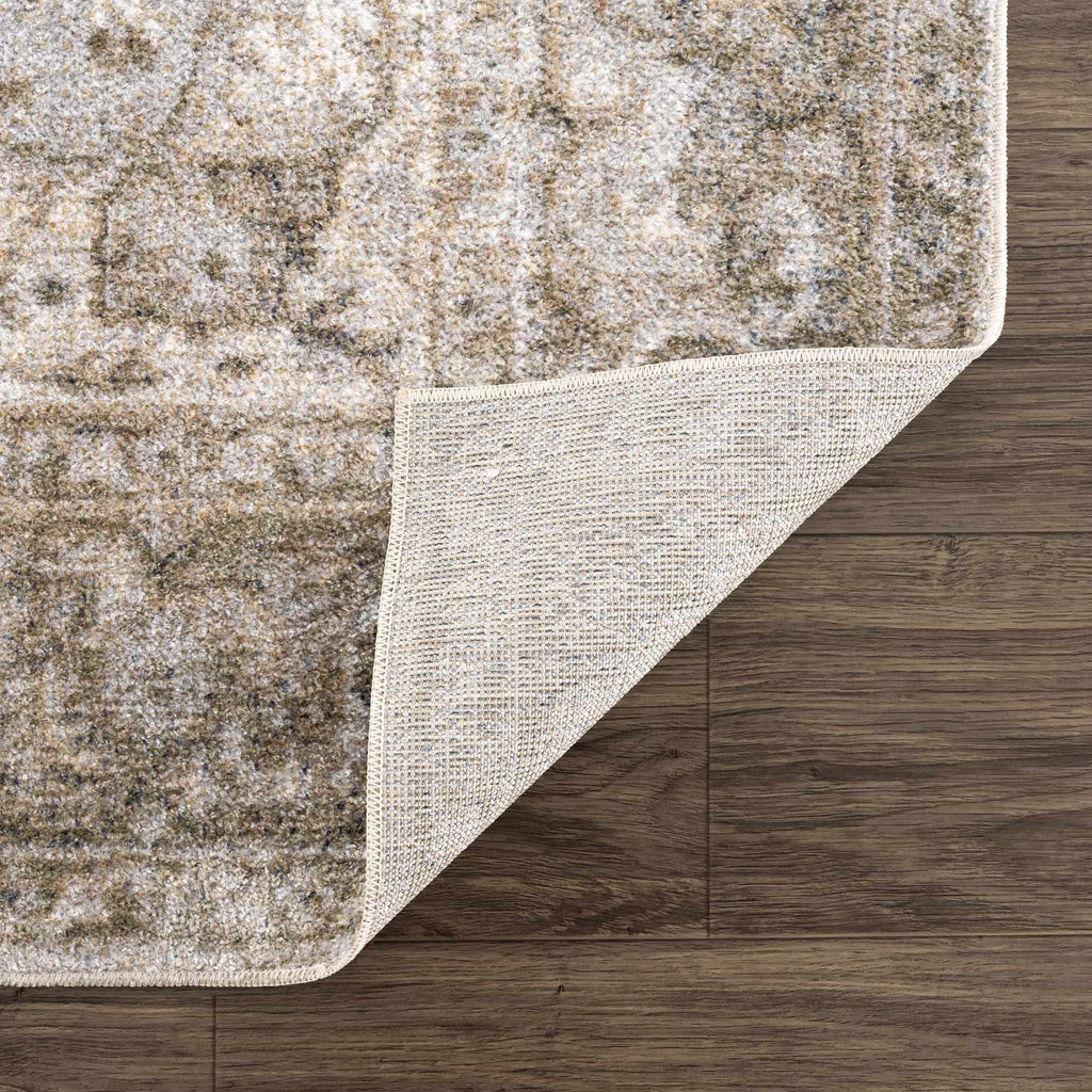 Textured area rug on a wooden floor