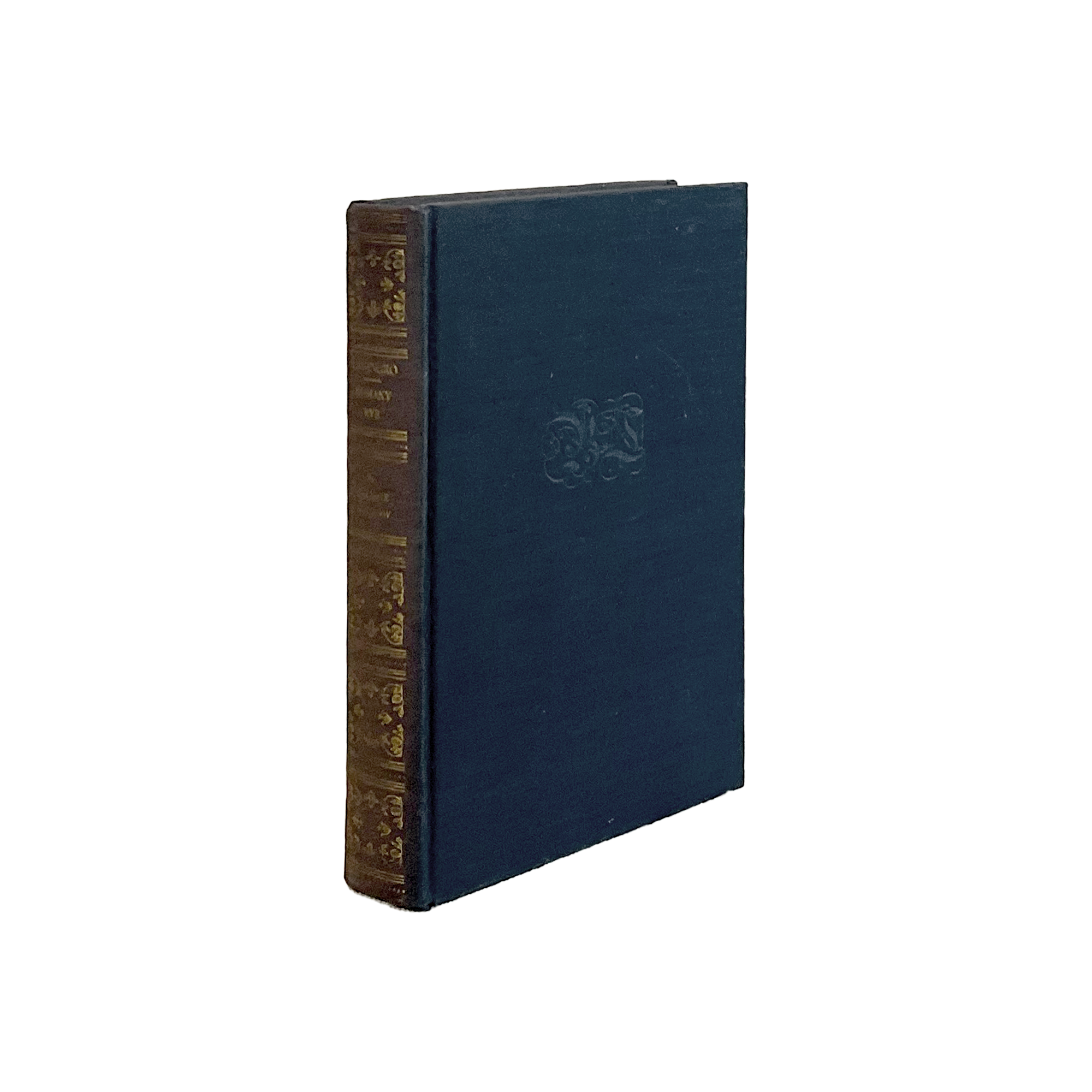 Blue leather-bound book with gold embossed design on a white background