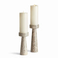 Neutral marble pedestal candle holders with soft ivory pillar candles and timeless European-inspired styling | Sorelle Rossi Shoppe