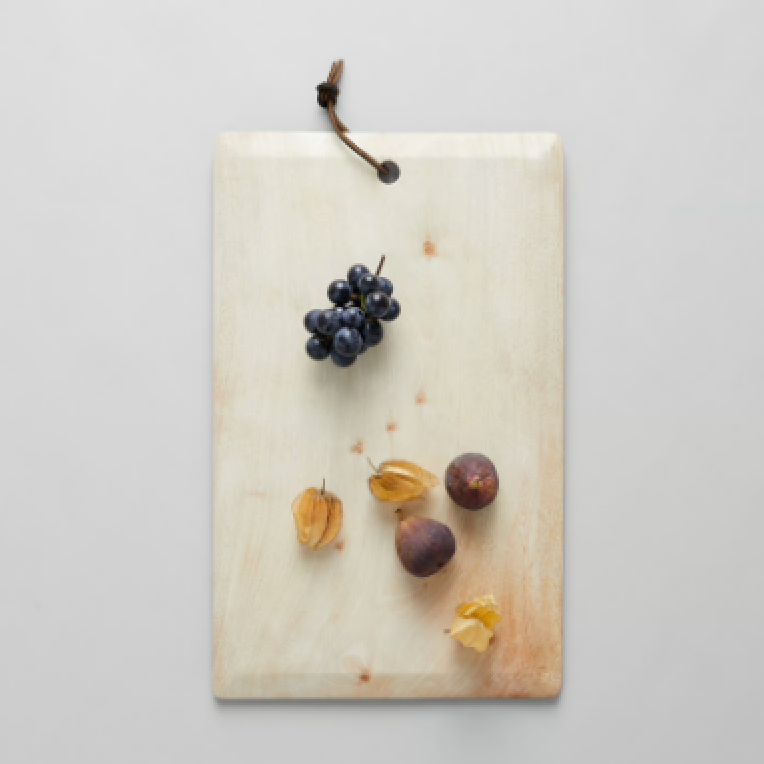 Neutral natural wood serving board with a sleek handcrafted silhouette for elevated kitchen decor | Sorelle Rossi Shoppe