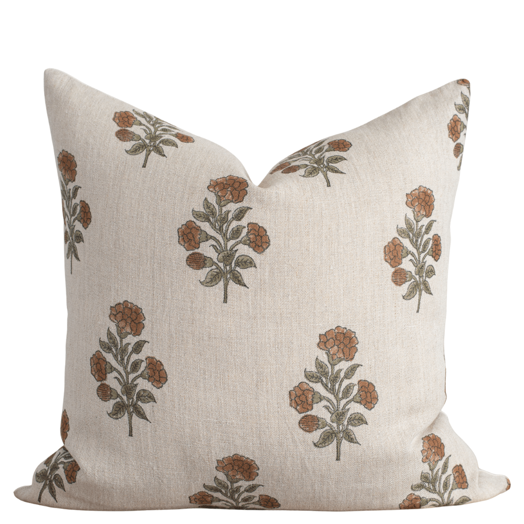 Decorative pillow with floral pattern on a beige background