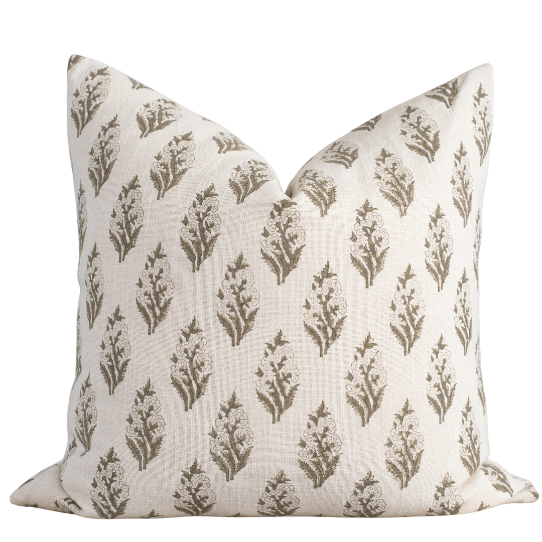 Decorative pillow with a floral pattern on a white background