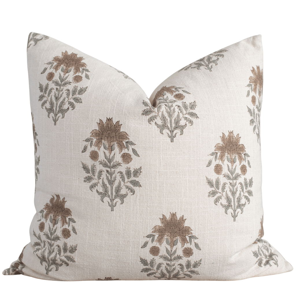 Decorative pillow with floral pattern on a white background