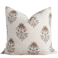 Decorative pillow with floral pattern on a white background