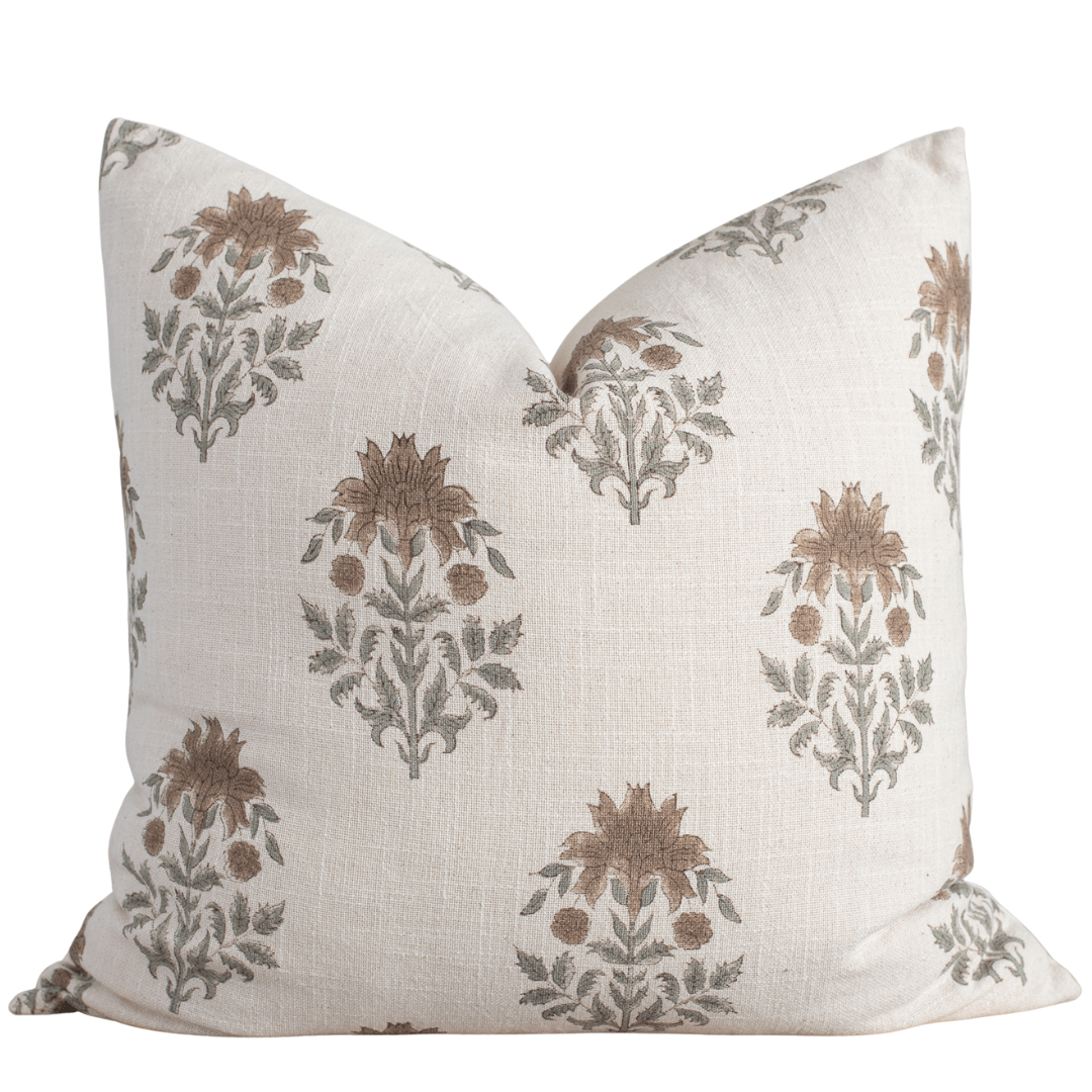 Decorative pillow with floral pattern on a white background