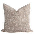 Decorative pillow with floral pattern on a beige background