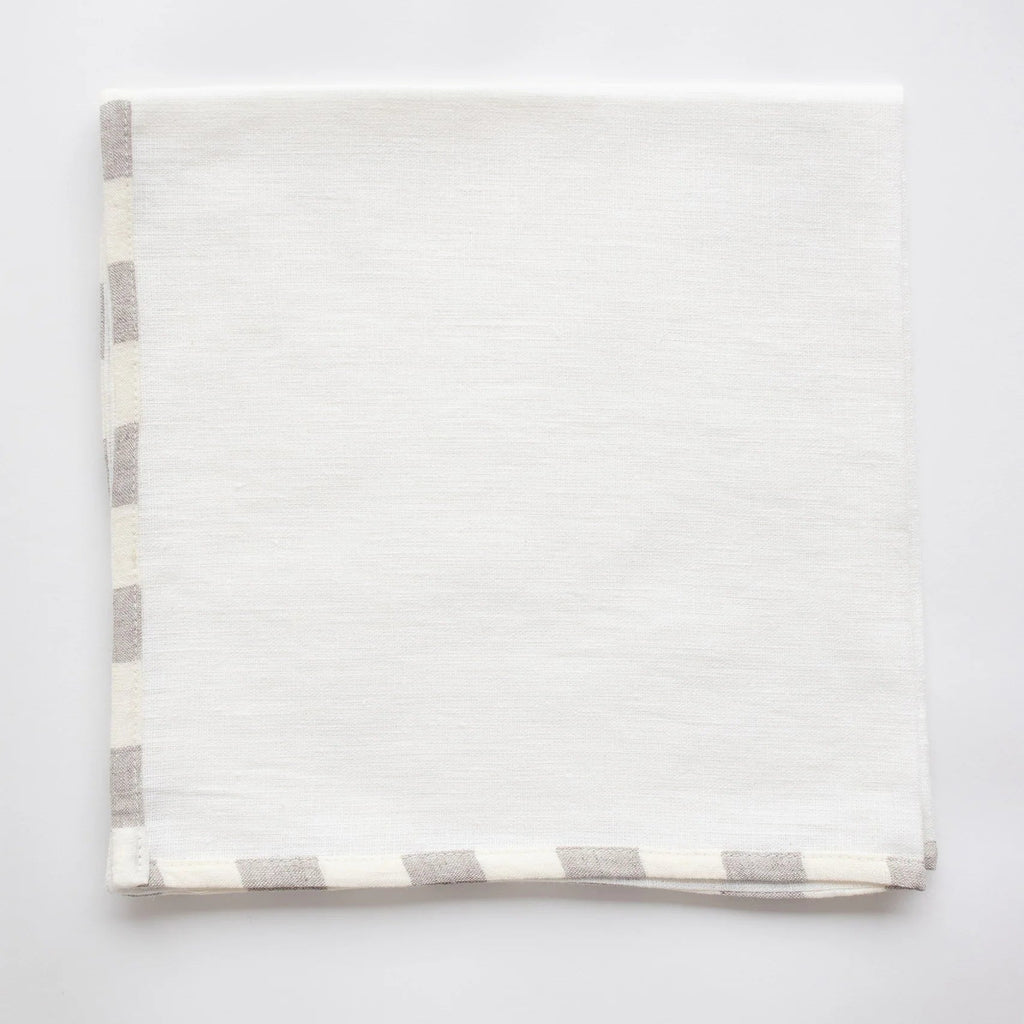 Soft neutral linen tea towel with subtle woven stripe detailing and timeless European-inspired kitchen styling | Sorelle Rossi Shoppe