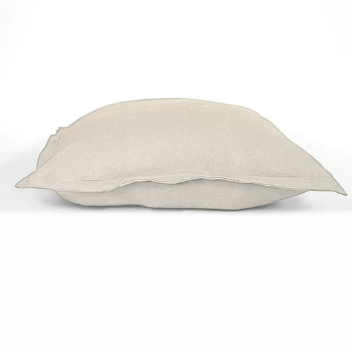 Beige pillow on a white background