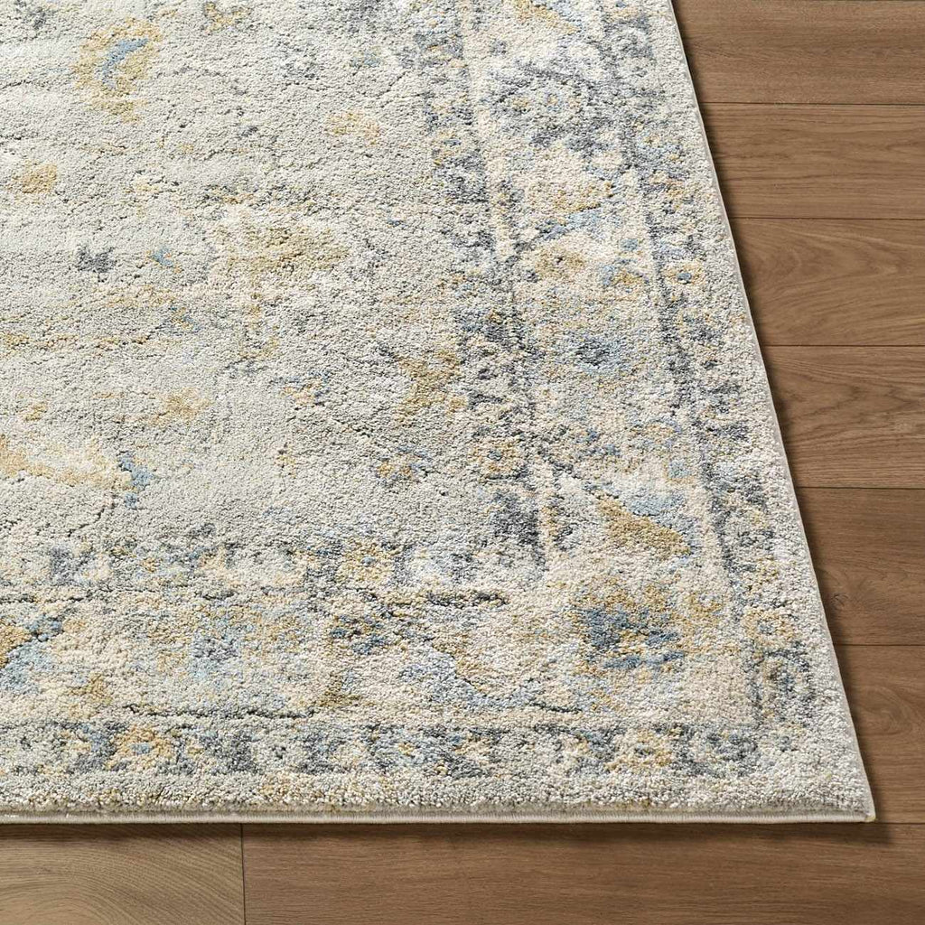 Textured area rug with a pattern on a wooden floor