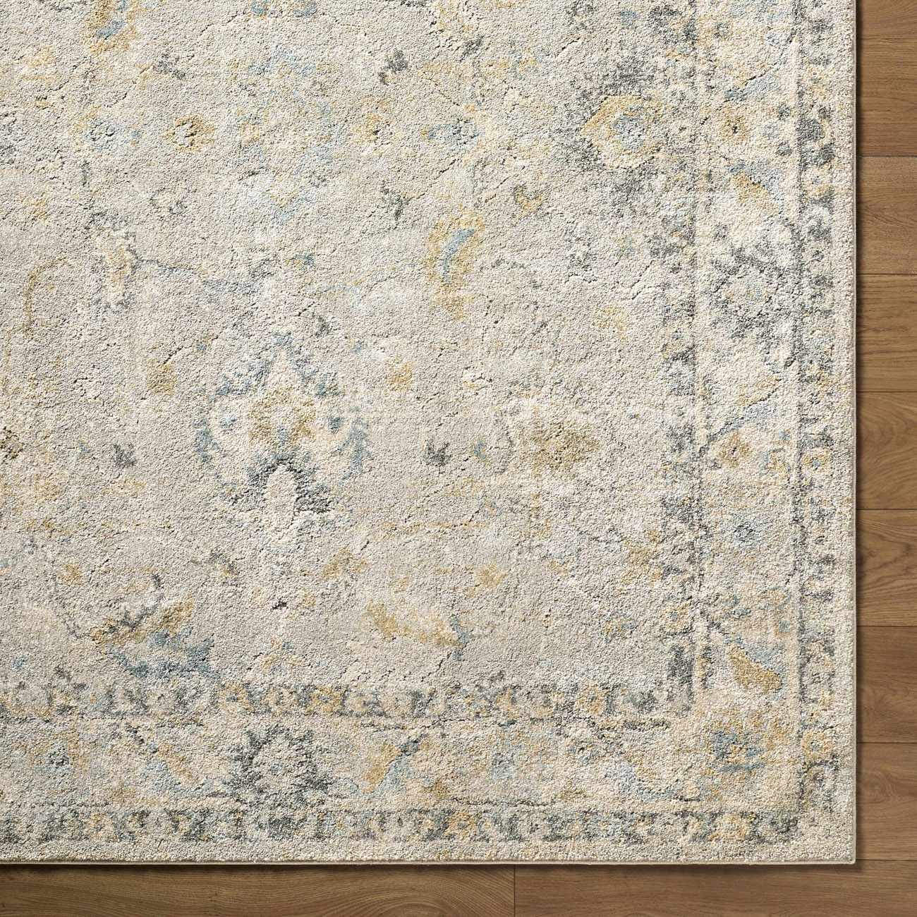 Textured area rug with a pattern on a wooden floor
