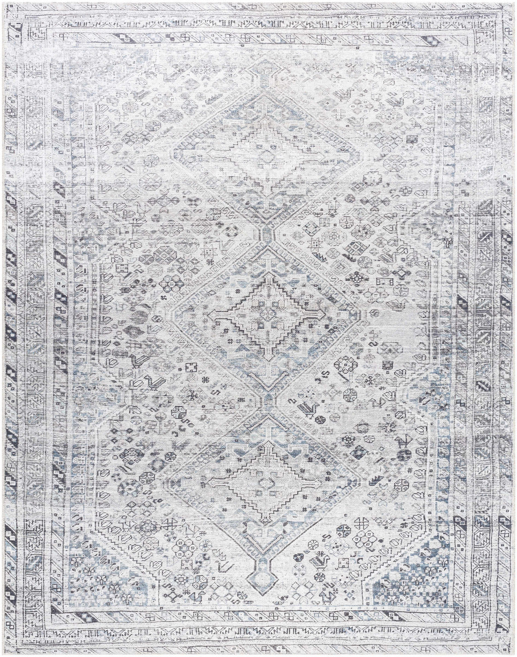 Patterned rug with geometric design in gray and white