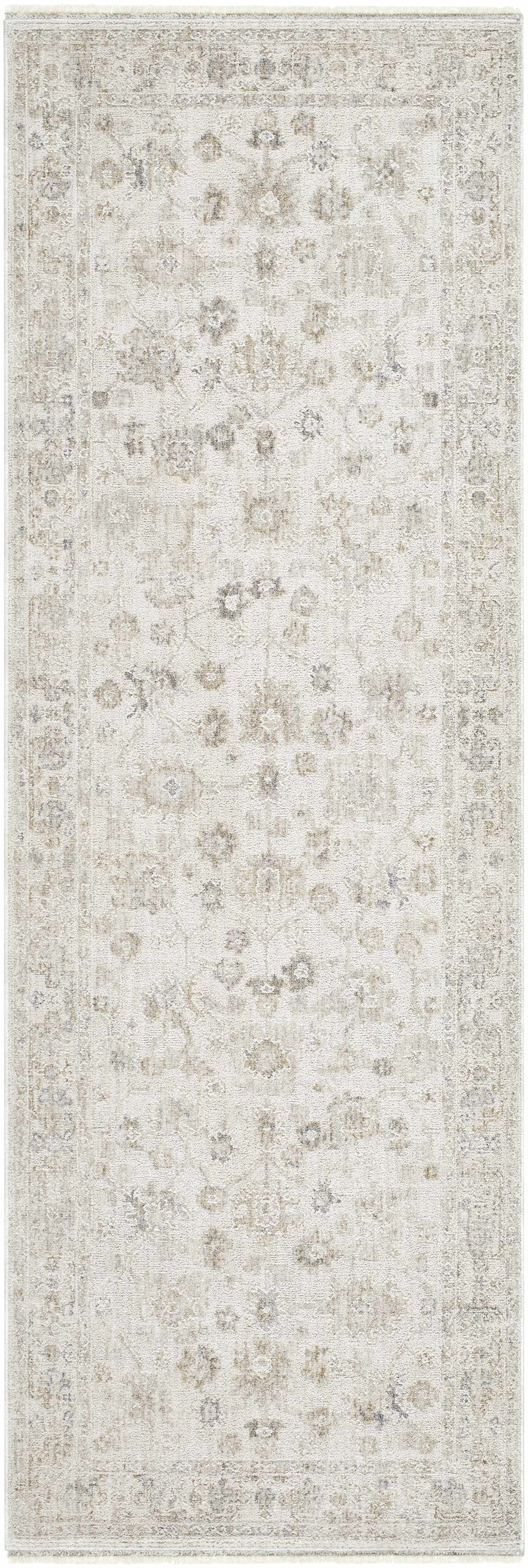 Floral patterned rug with a light color scheme on a plain background