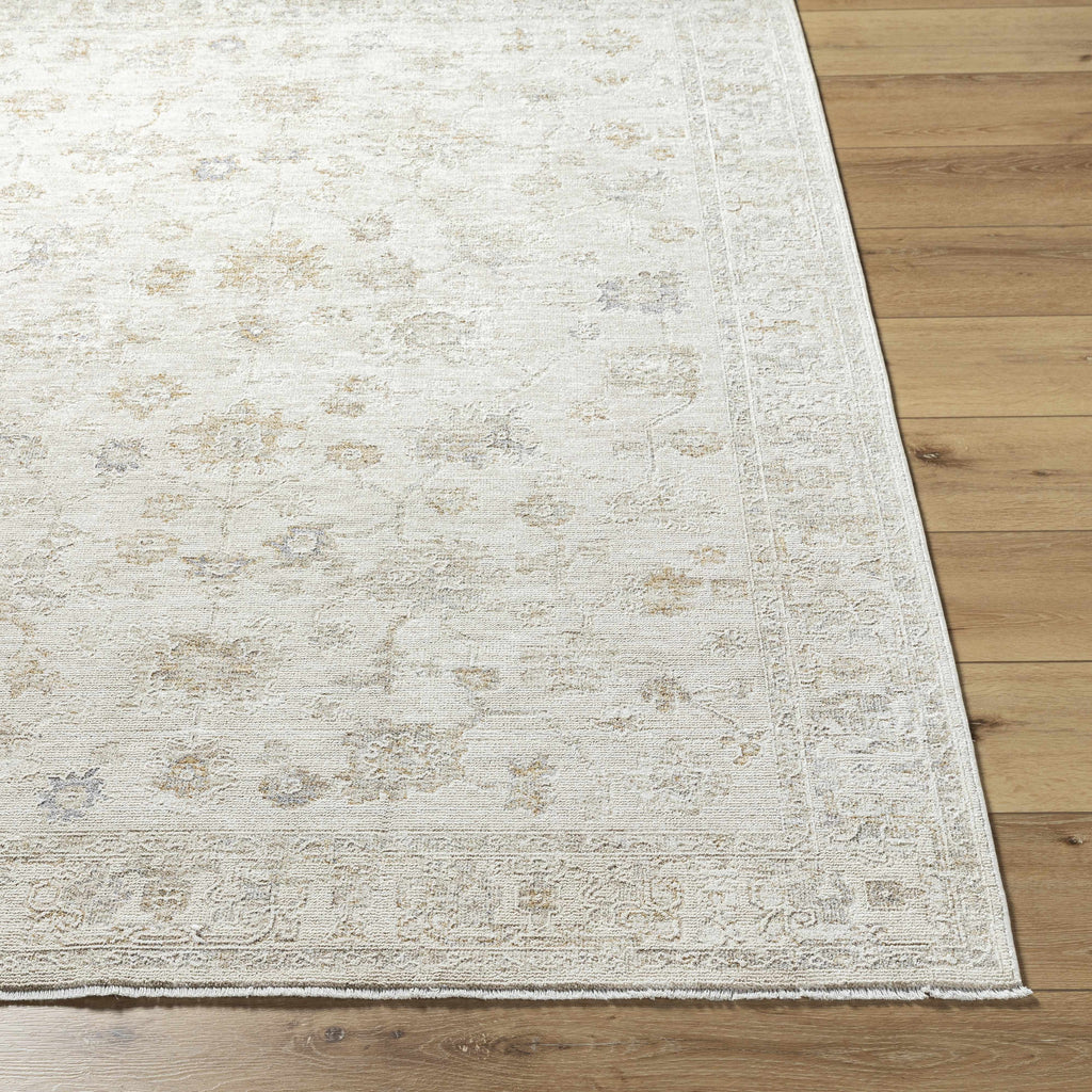 White textured rug on a wooden floor