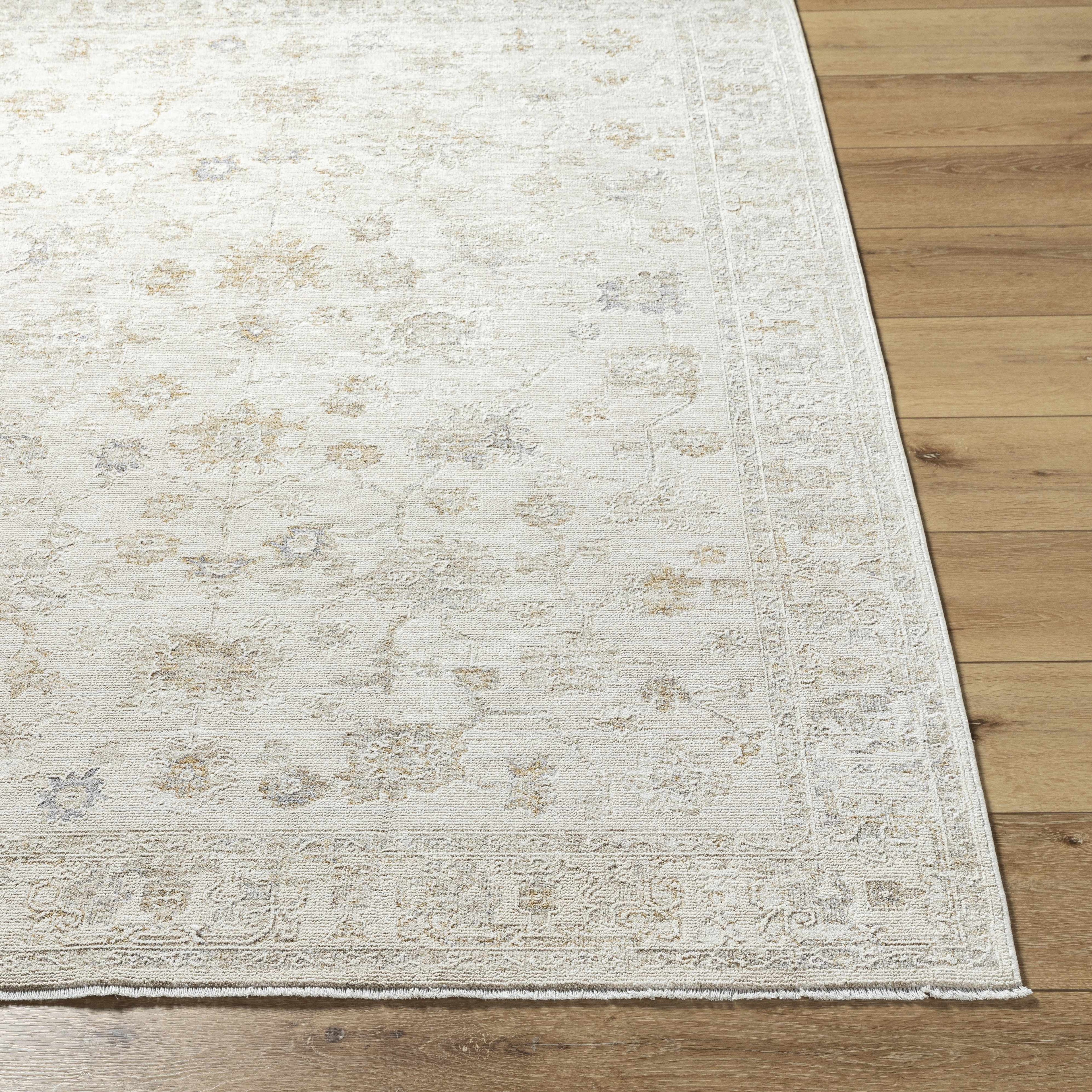 White textured rug on a wooden floor